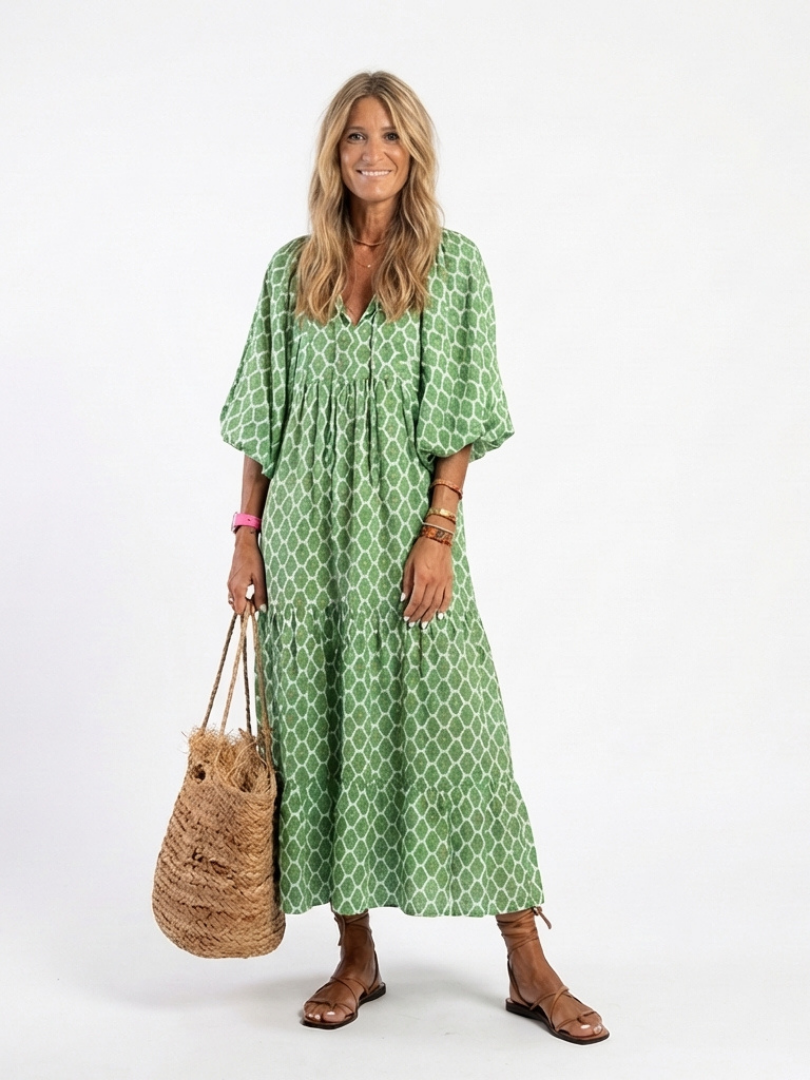 patterned midi dress with sleeves Ivory Floral Flutter Sleeve Midi Dress | Avara